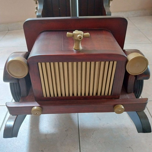 Rocking wooden car made of beech and pine