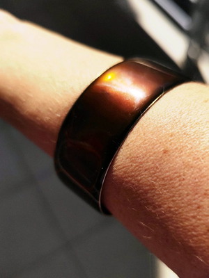 Brown bracelet used, glossy with metal interior