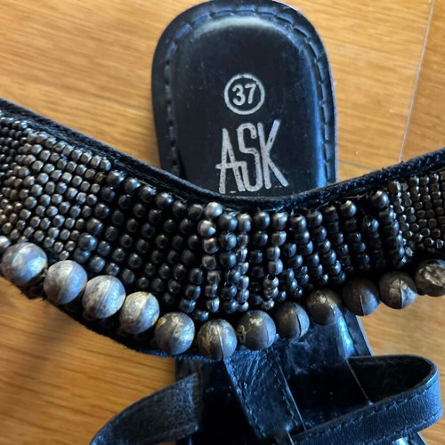Leather vintage black sandals new, decorated with metal pearls