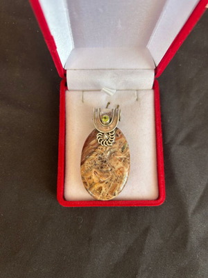Silver pendant 925 with embossed face design used