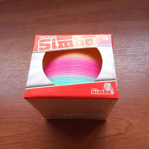 Collectible Slinky Simba spring toy 2000s new, sealed packaging