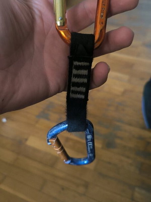 Climbing equipment used, set of 2 carabiners with Kong strap