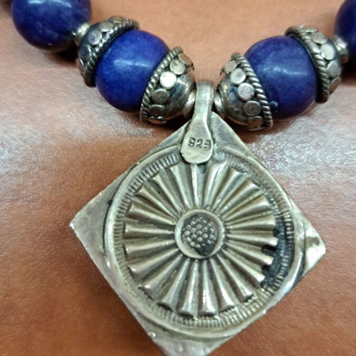 Necklace with blue semi-precious stones and silver setting like new