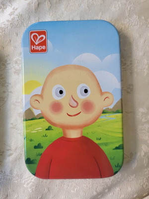 Hape pocket game like new with magnetic faces