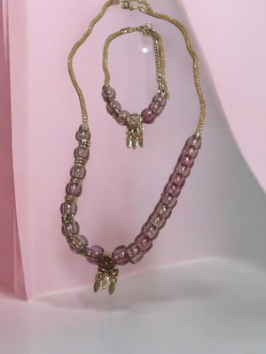 Handmade jewelry set with plastic beads and silver dreamcatcher elements