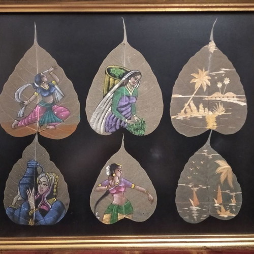 Painting with African figures hand-painted on dried leaves with gold frame and glass