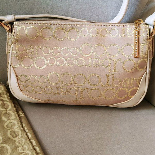 Rocco Barocco handbag used beige with gold letters and metal details