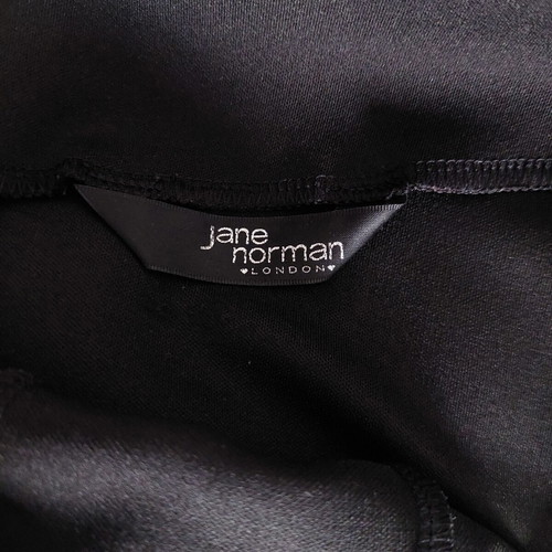 Jane Norman black mini dress with gold metal neckline small, like new