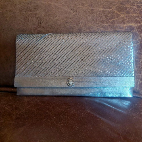 Vintage silver envelope hand bag like new with strap