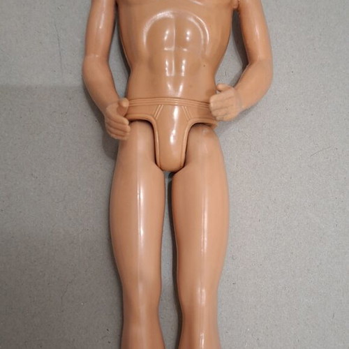 Ken doll used