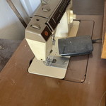 Singer sewing machine with cabinet