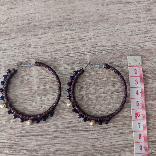 Hoop earrings with waxed metallic thread and decorative crystals