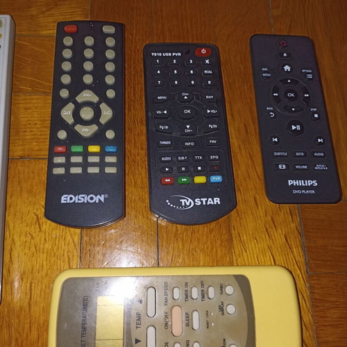 Set of 7 different TV remote controls
