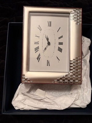 Table clock new with silver details and wooden back