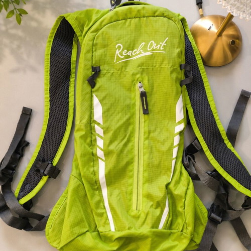 Reach Out Crivit Sports backpack like new, lightweight, reflective details