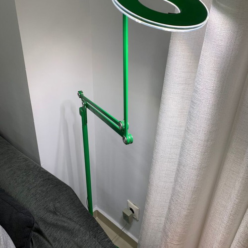 Modern floor lamp used with rotating arm and LED lighting