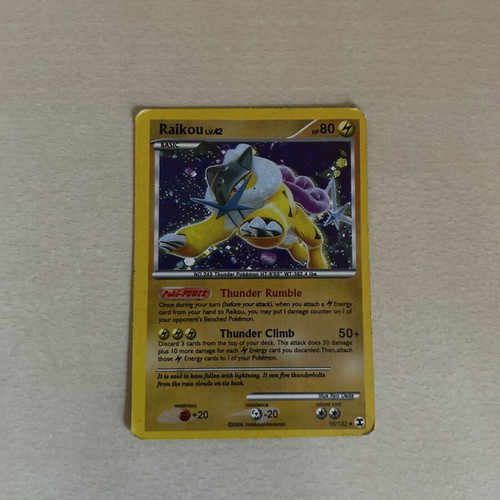 Pokemon collectible card Raikou used, rare