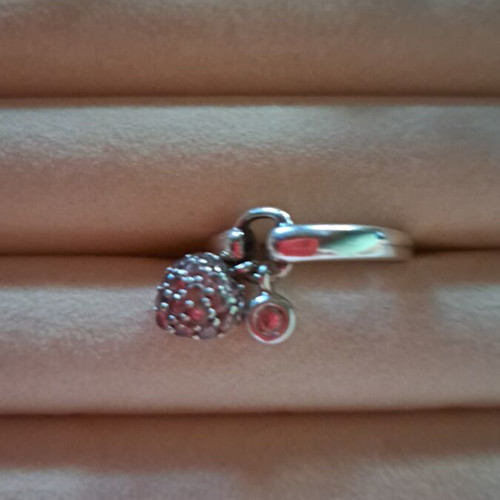 Silver ring with 2 charms like new