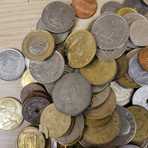 Coins used, old and many, from various nationalities 1945-2015