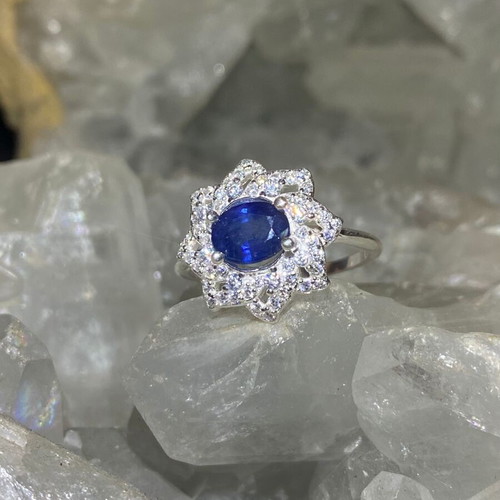 Handmade silver ring with natural blue sapphire and moissanites