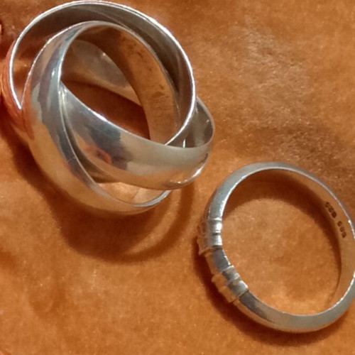 Silver 925 rings, one triple band and one with 585 gold tones