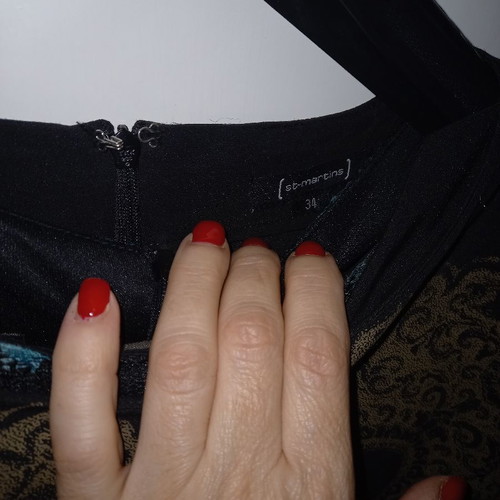 St-Martins black dress worn twice