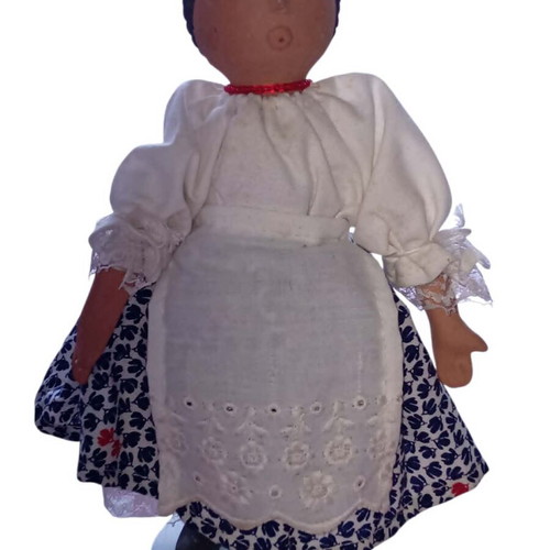 Handmade fabric doll with traditional folk costume used