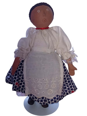Handmade fabric doll with traditional folk costume used