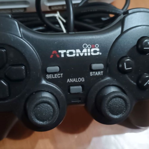 PSone slim console with third-party memory card and controller