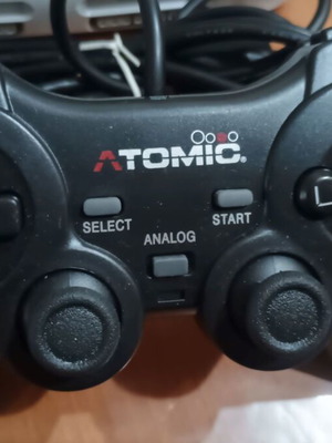 PSone slim console with third-party memory card and controller