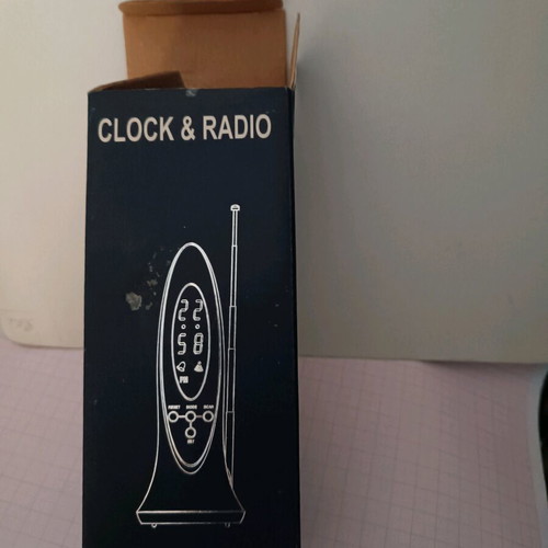 Radio and desk clock new, height 17 cm