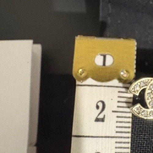Chanel Classic Mini Logo Light Gold Stud Earrings like new with pearl