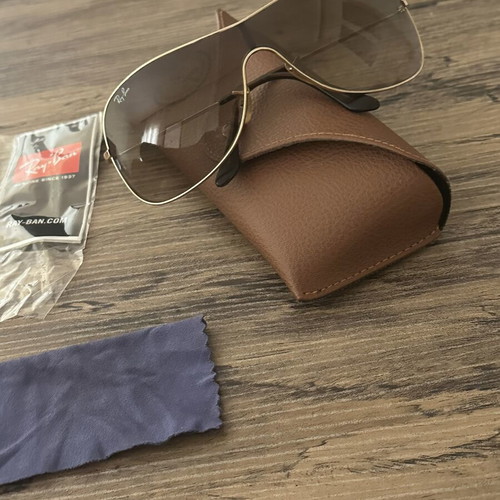 Ray Ban sunglasses with gold frame like new