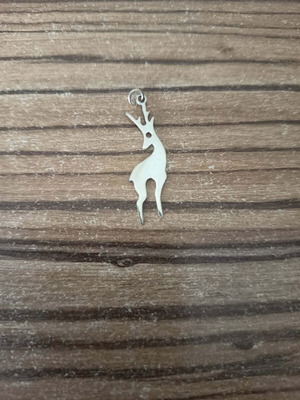 Metal deer-shaped motif like new