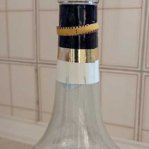 Vintage banana liqueur bottle used, empty for collection