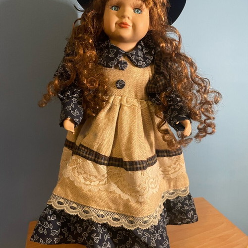 Vintage doll 40cm with base and porcelain face like new