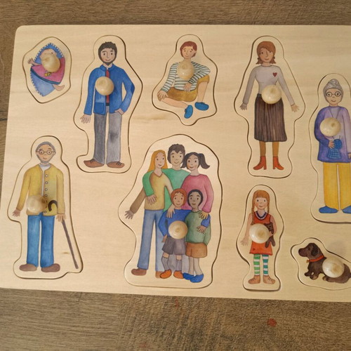 Wooden family puzzle with pegs like new