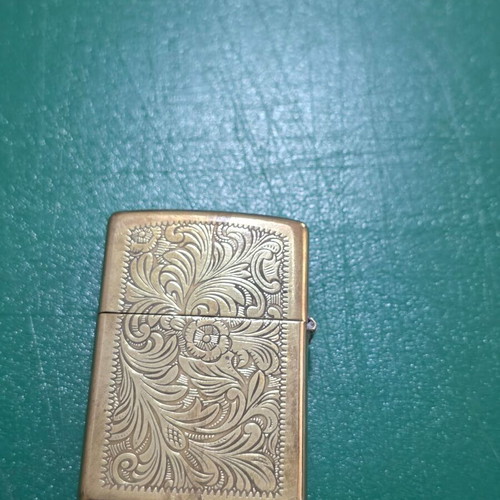Vintage ZIPPO lighter in gold color, Venetian filigree design