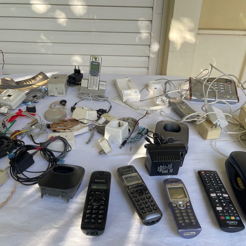 Set of old cables, sockets and telephony devices used