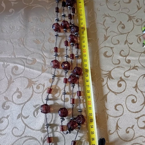 Long necklace used with brown beads, lightweight