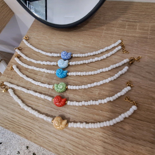 Handmade bracelets made to order with glass beads and ceramic shells