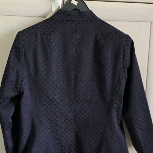 Black H&M jacket with three-quarter sleeve and purple embroidery size medium like new
