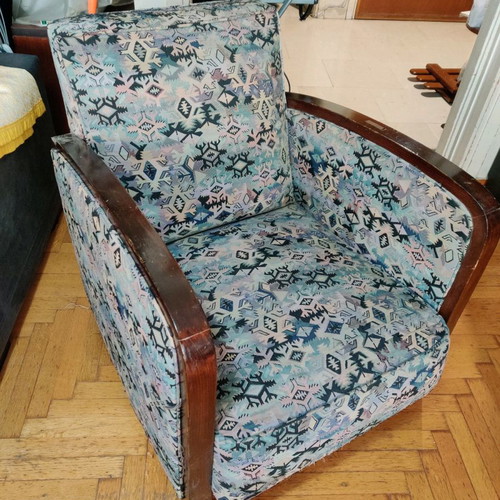 Armchair used made of good wood with fabric cover