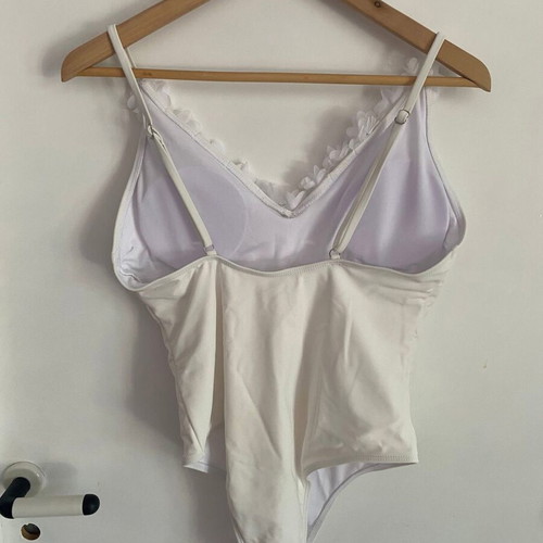 Ladies white swimsuit with flower details, size medium