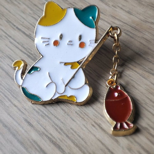 Metal cat brooch fishing with rod