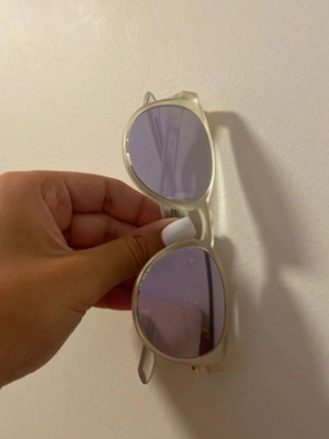 Adidas Originals sunglasses with transparent frame and purple mirror lenses