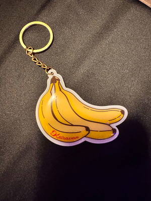 Karavan Banana Keychain like new, white and yellow