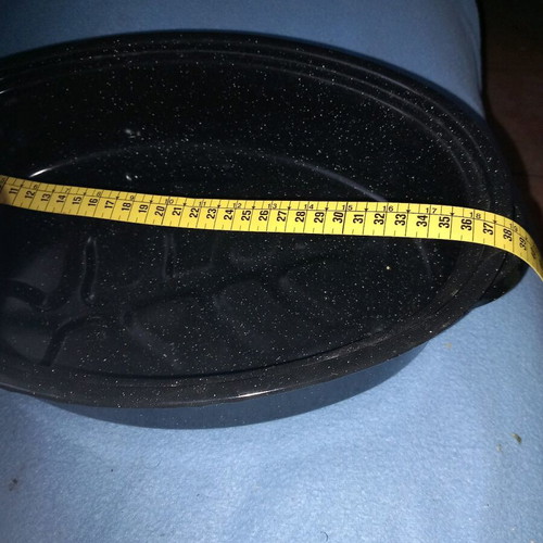 Small new black roasting pan