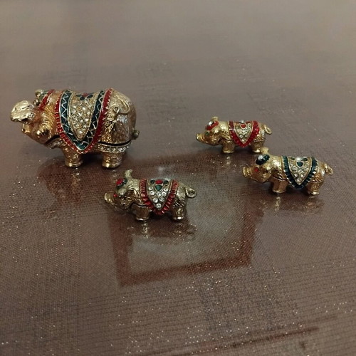 Forged Gianniotika Pig Figurines like new, set of 4 for positive feng shui
