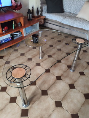 Glass coffee table with metal legs